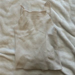 White tank top with crossed back.